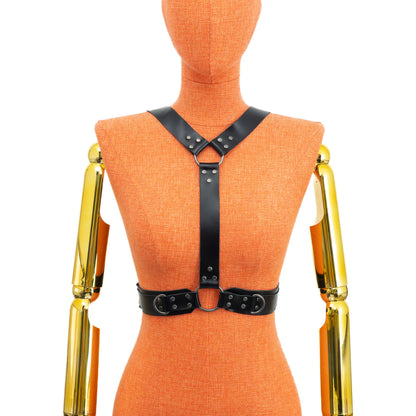 Back three-quarter view of the harness reversed on a mannequin, showing two separate straps running down the back while a single central strap passes between the bust at the front; wide waist belt 1 1/2 inch with layered 1 inch strap; dark nickel hardware.