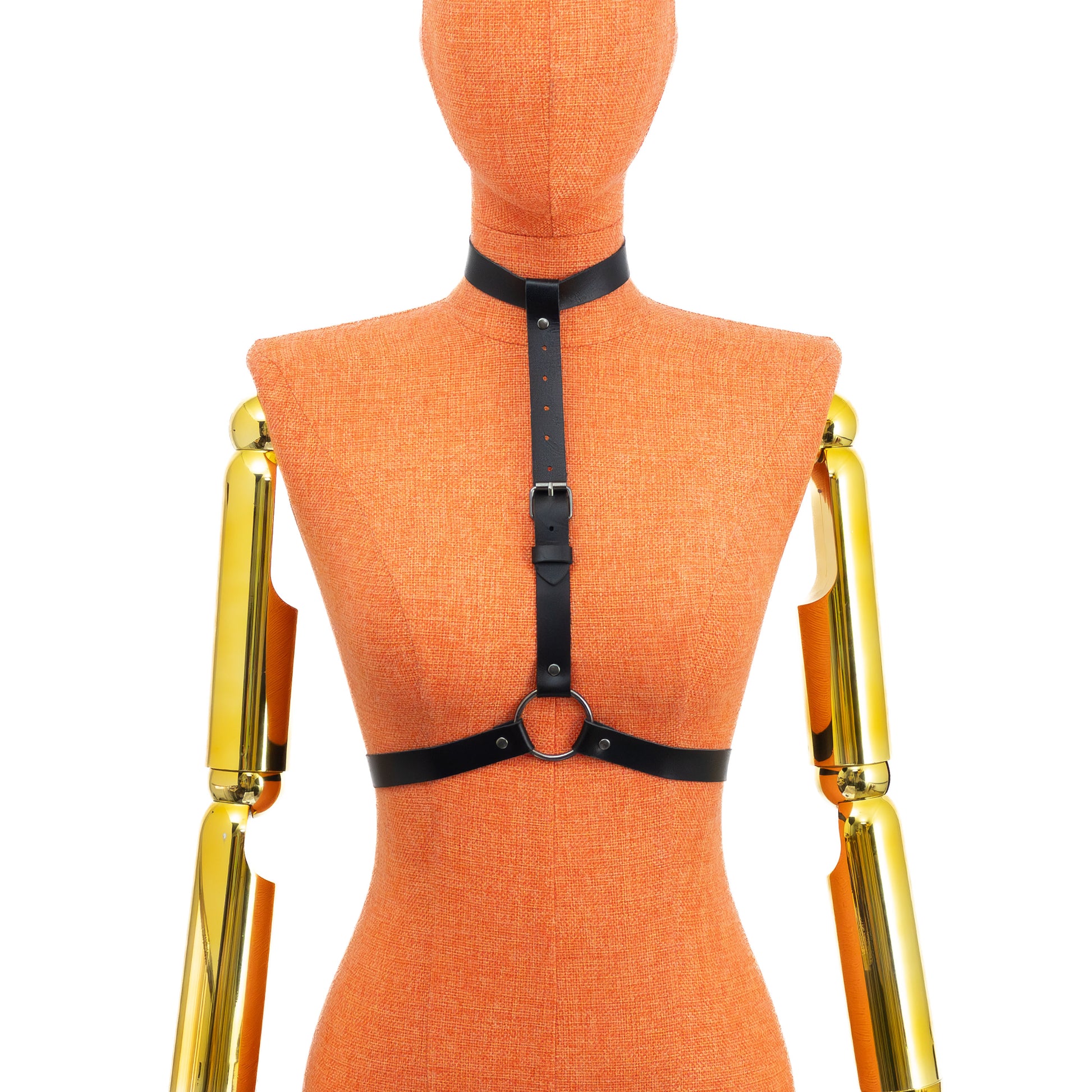 Black genuine leather minimalist O-ring harness on mannequin, dark nickel hardware, front view showing 3/4 inch (2 cm) choker, vertical strap and waist belt connected through central O-ring; leather thickness 1.4–1.8 mm.