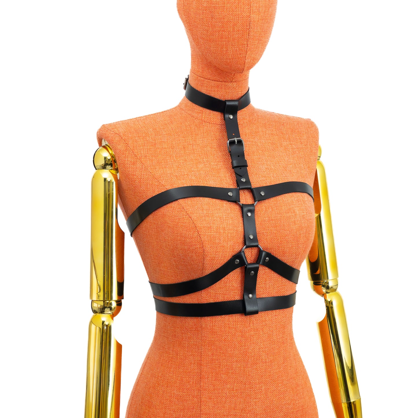 Black genuine leather triple strap chest harness on mannequin with 3/4 inch (2 cm) straps and dark nickel hardware, semi-side view showing choker, vertical strap alignment, two rings and layered horizontal straps wrapping to the back; leather thickness 3.5–4.5 oz (1.4–1.8 mm).