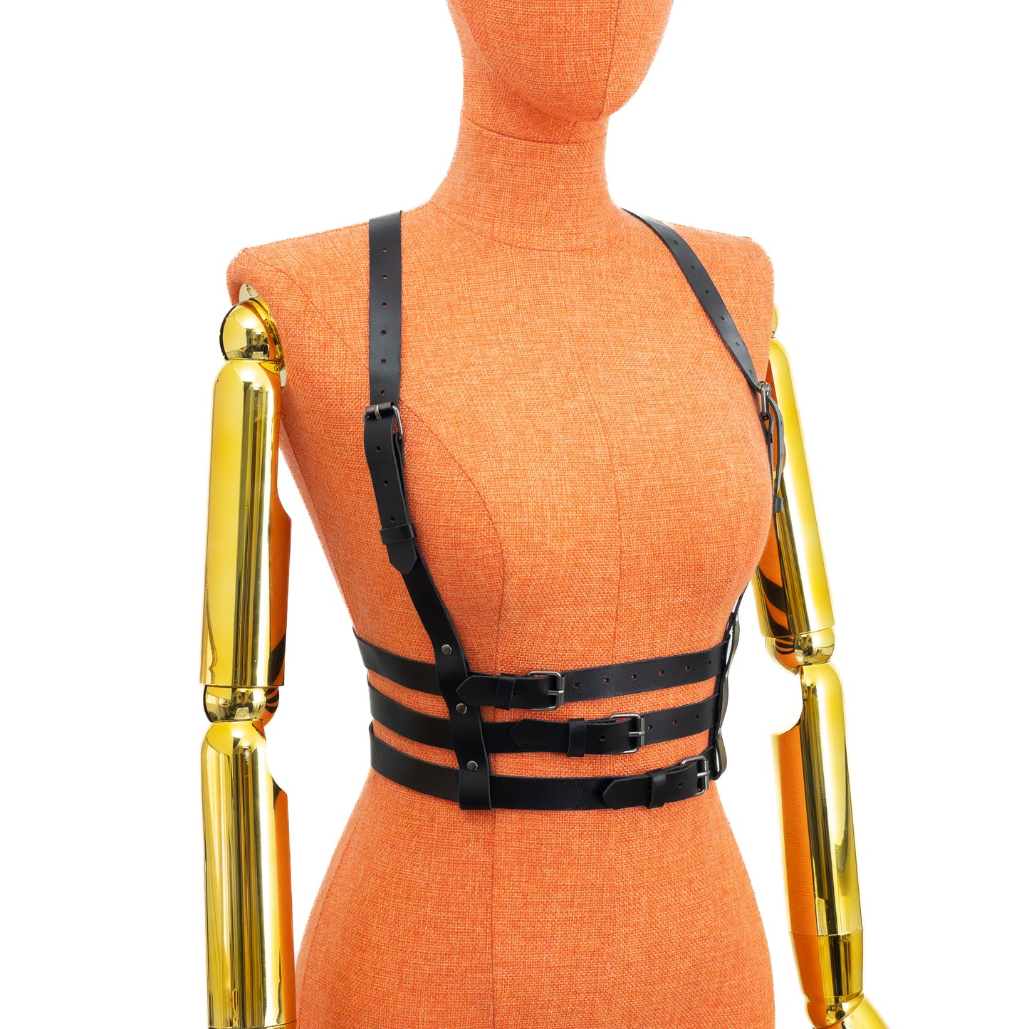 Triple Waist Strap Leather Harness on mannequin, side view, black genuine leather with dark nickel hardware, visible shoulder straps, vertical back strap and layered waist straps forming structured silhouette; leather thickness 3–4 oz (1.4–1.8 mm).