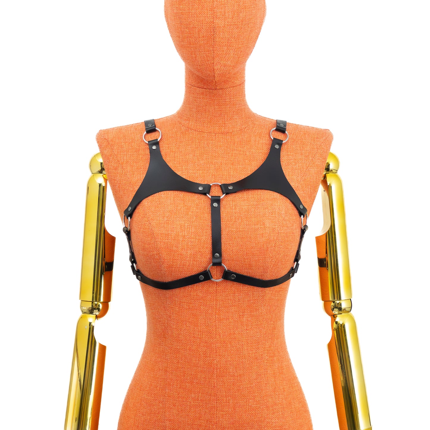 Open Cup Leather Bra on mannequin, back view, genuine black leather with silver metal hardware, horizontal back strap with buckle closure and two adjustable shoulder straps, classic bra-style fastening structure visible; strap width 5/8 inch (15 mm), leather thickness 3–4 oz (1.4–1.8 mm).