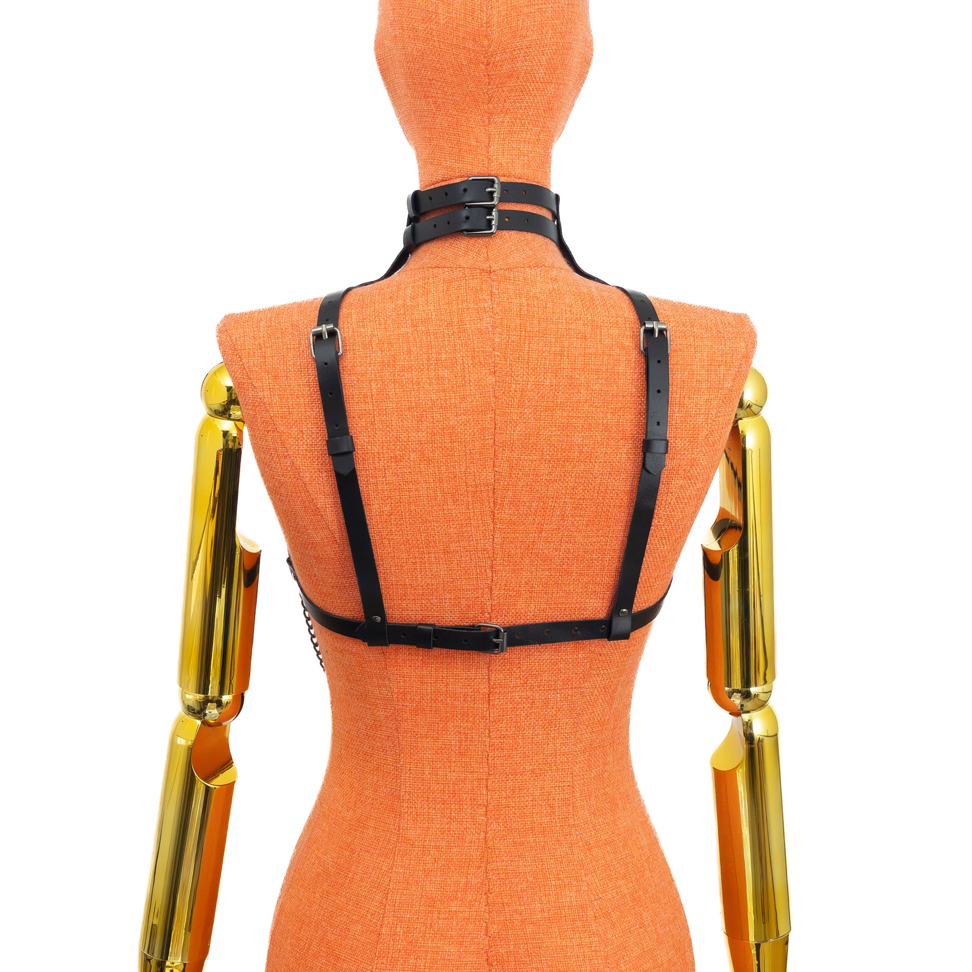 Diamond Pattern Leather Harness Choker with Underbust Chains on mannequin, front view, genuine black leather with dark nickel hardware, double collar, diamond strap structure across chest, small central ring between breasts, chains resting under bust; strap width 5/8 inch (15 mm), leather thickness 3–4 oz (1.4–1.8 mm).