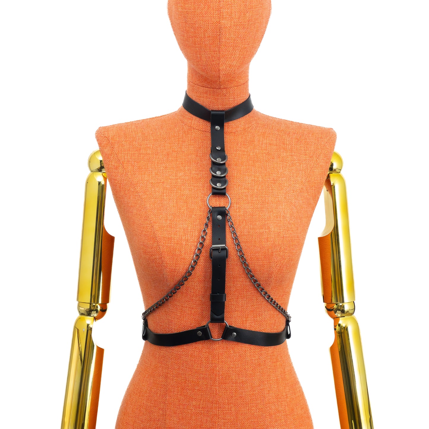 Back view on mannequin of black leather collar harness, showing buckle fastening at the neck and at the waist, with dark nickel hardware; the construction is secured from the back for fit adjustment.
