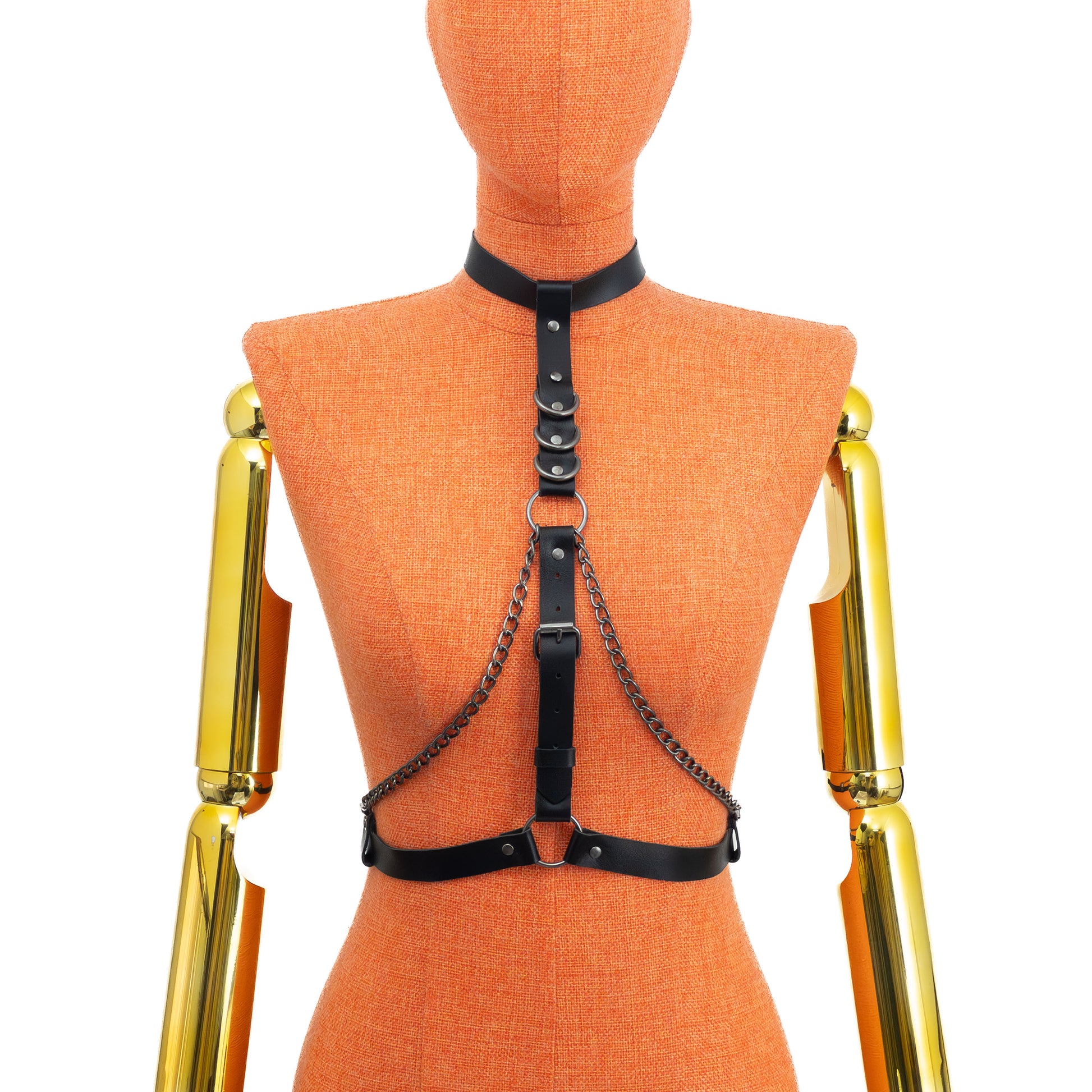 Back view on mannequin of black leather collar harness, showing buckle fastening at the neck and at the waist, with dark nickel hardware; the construction is secured from the back for fit adjustment.