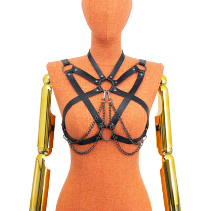 Black leather harness with chain details on an orange mannequin against a white background