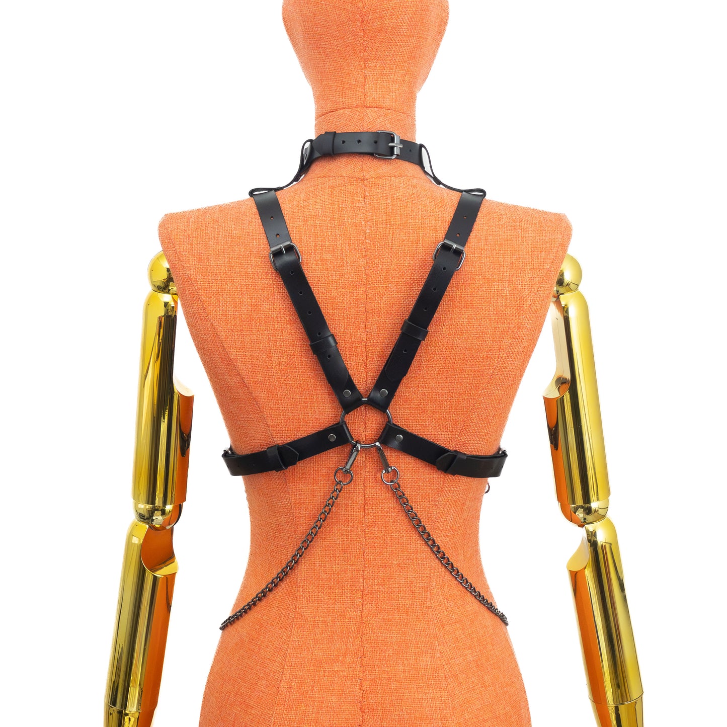 Leather Harness with Chains and Detachable O-Ring Choker on mannequin, back view, genuine black leather with dark nickel hardware, X-back adjustable straps and central rear ring, layered chains attached to rear ring; leather thickness 3–4 oz (1.4–1.8 mm), strap width 3/4 inch (20 mm).
