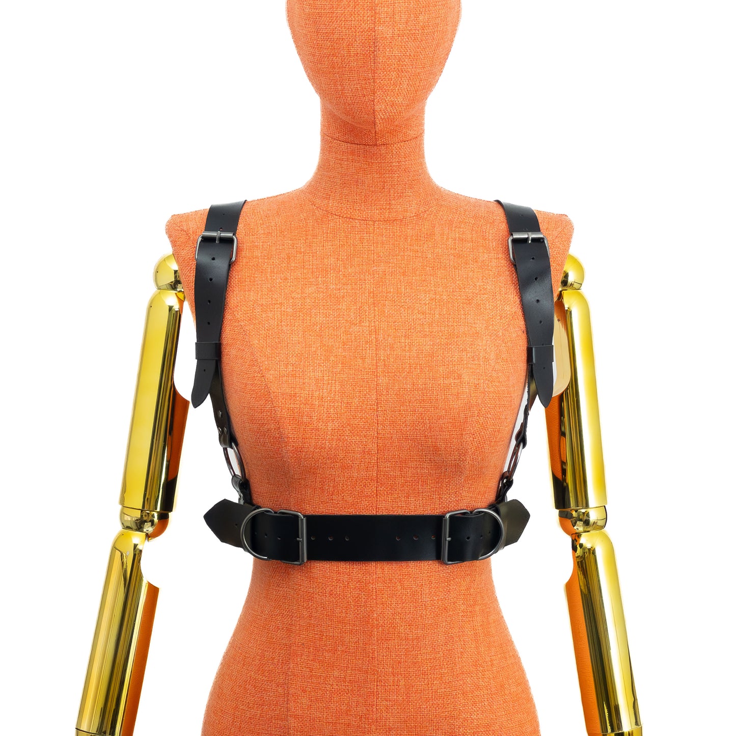 Front view of a black leather wide waist chest harness displayed on a mannequin, showing the 1 1/2 inch waist belt with double buckle adjustment and 1 1/4 inch shoulder straps running from the back ring structure to the belt; dark nickel hardware; leather thickness 1.4–1.8 mm.