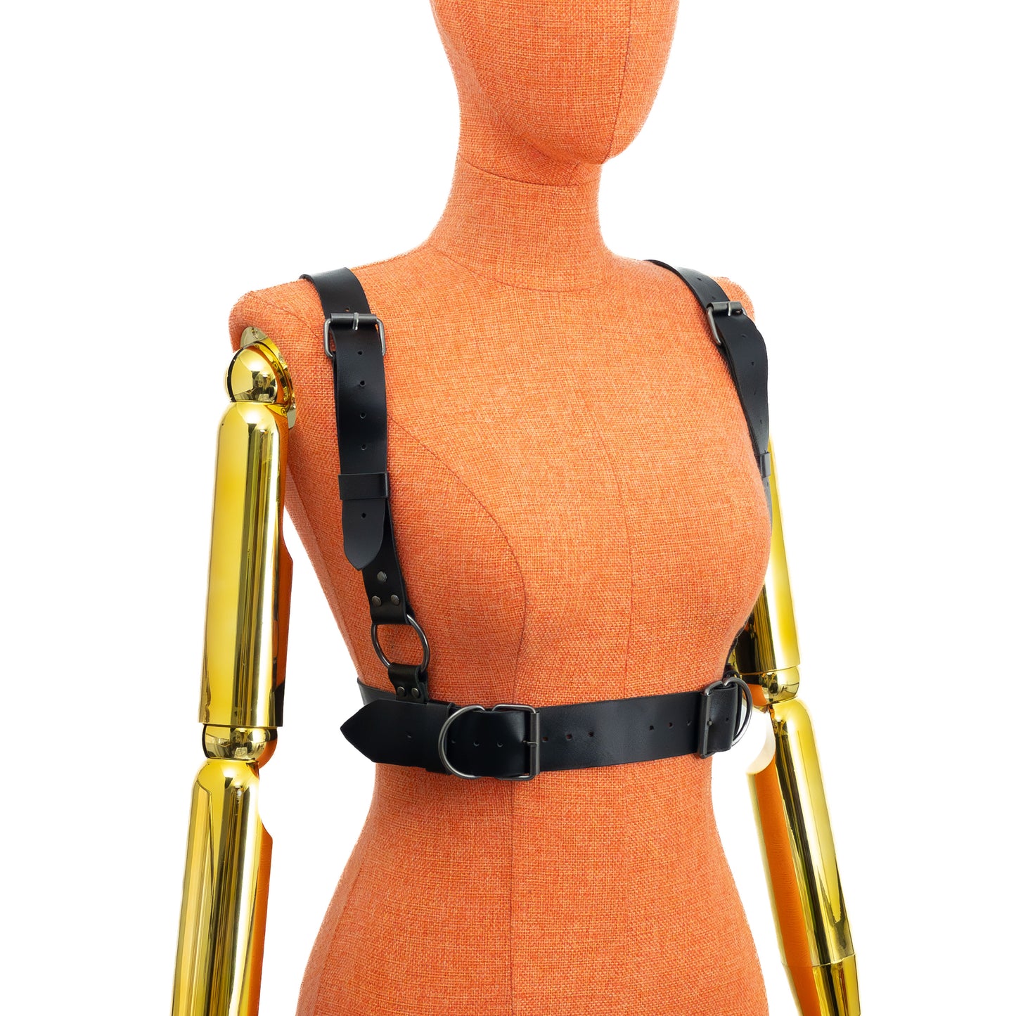 Three-quarter side view of a black leather wide waist chest harness on a mannequin, showing shoulder straps passing over the shoulders and attaching to the wide waist belt, with dark nickel rings and buckles visible; leather thickness 1.4–1.8 mm.