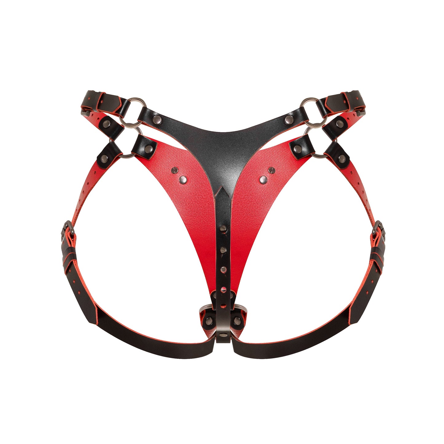 Back view of an adjustable strap-on harness with a thong-style rear construction, adjustable leather straps, round metal rings, black leather with red edges, and dark nickel hardware.