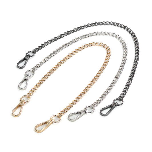 Long metal chain connector with carabiners shown on a white background, three finishes displayed together: gold, silver, and dark nickel. Each connector is a single 15.75-inch (40 cm) metal chain with a carabiner on both ends, laid flat so the chain links and hardware finishes are clearly visible.