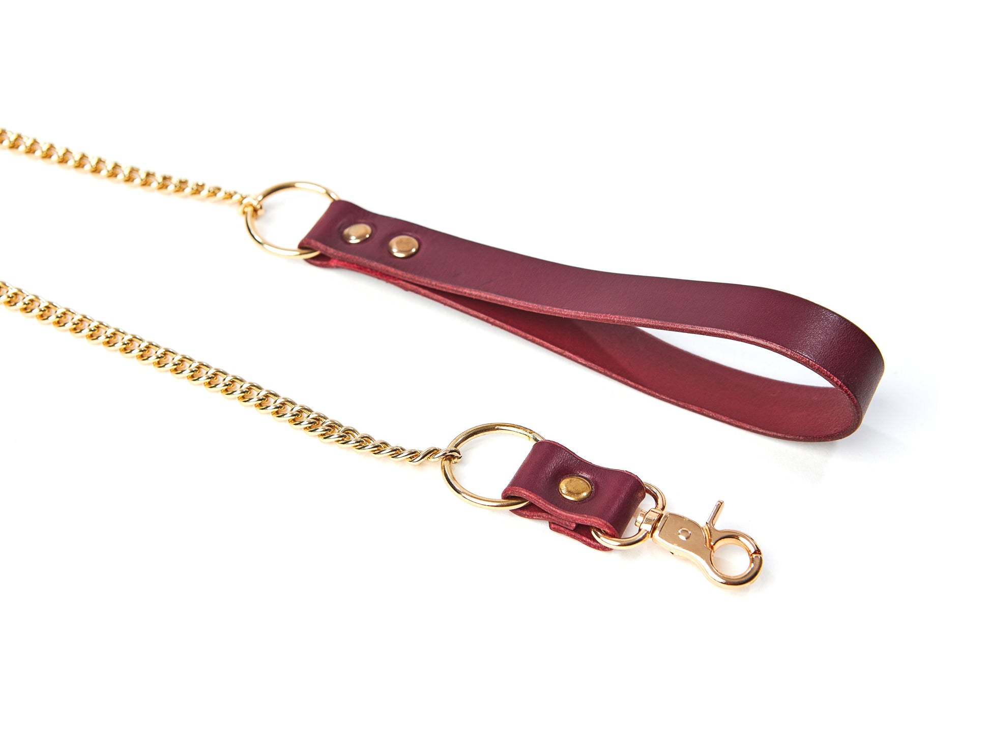Marsala leather leash with gold chain and clasp on a white background