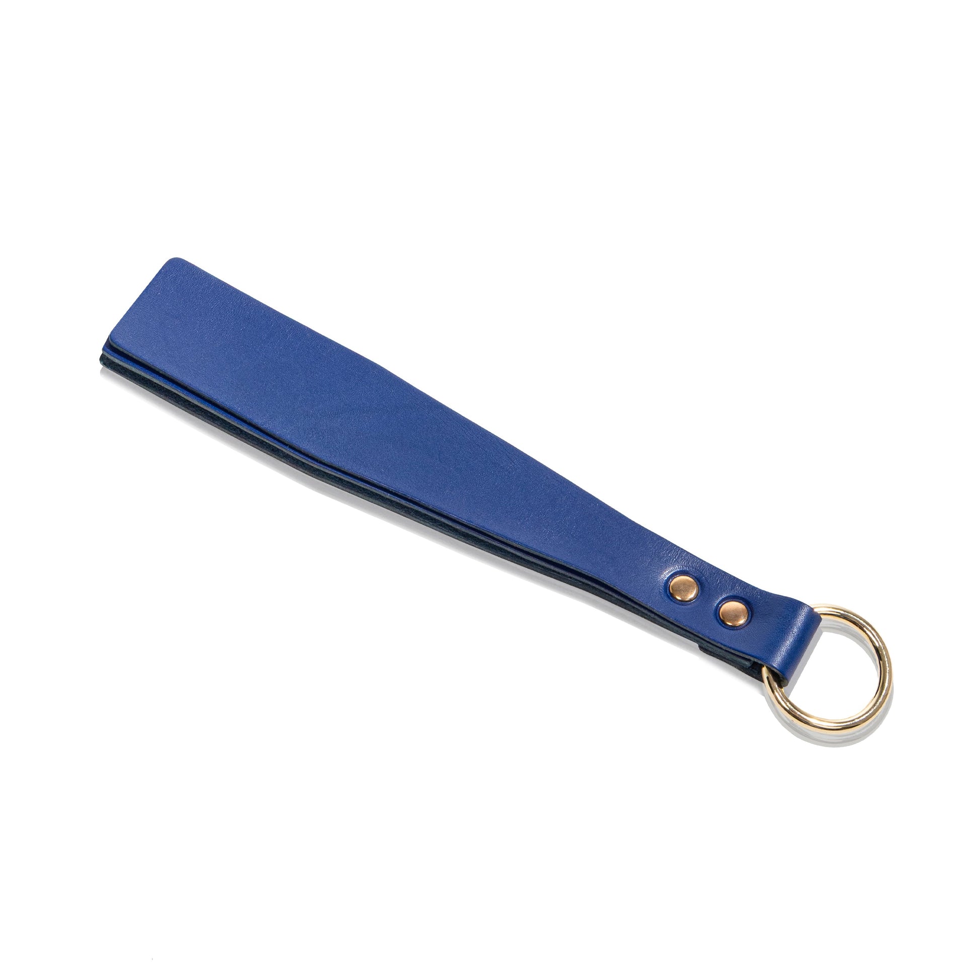 Handmade Classic Short leather paddle displayed flat on a white background. The image highlights the layered leather construction, clean straight profile, rounded corners, and metal O-ring integrated into the handle.