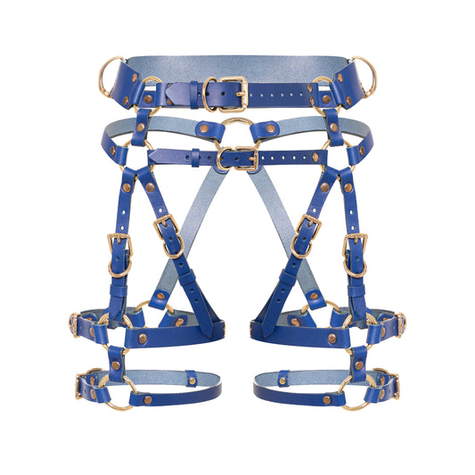 Front close-up of a deep blue open crotch leather garter belt with adjustable straps, thigh straps, D-rings, double-ended metal snap hook connectors, and gold-tone metal hardware.
