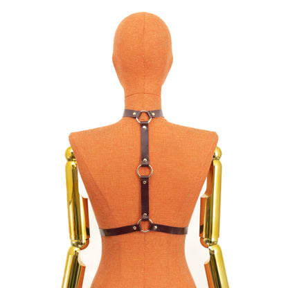 Bondage Harness Choker with Three O-Rings on mannequin, back view, marsala leather and gold hardware, vertical strap with three O-rings positioned along spine and waist straps closed with buckle.