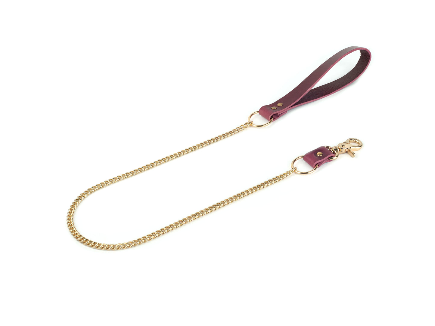 Gold chain leash with a marsala leather handle on a white background