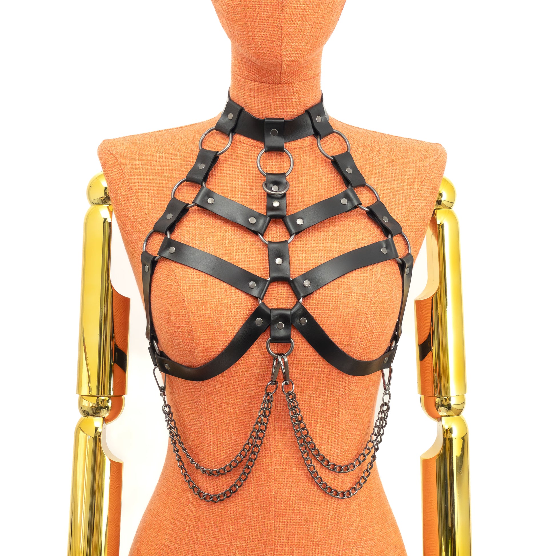 Open Bust Cage Leather Harness with Removable Chains on mannequin, front view, genuine black leather with dark nickel hardware, choker collar, three vertical straps and intersecting cage grid outlining bust, detachable double chain drapes attached at lower front; strap width 3/4 inch (2 cm), leather thickness 3–4 oz (1.4–1.8 mm).