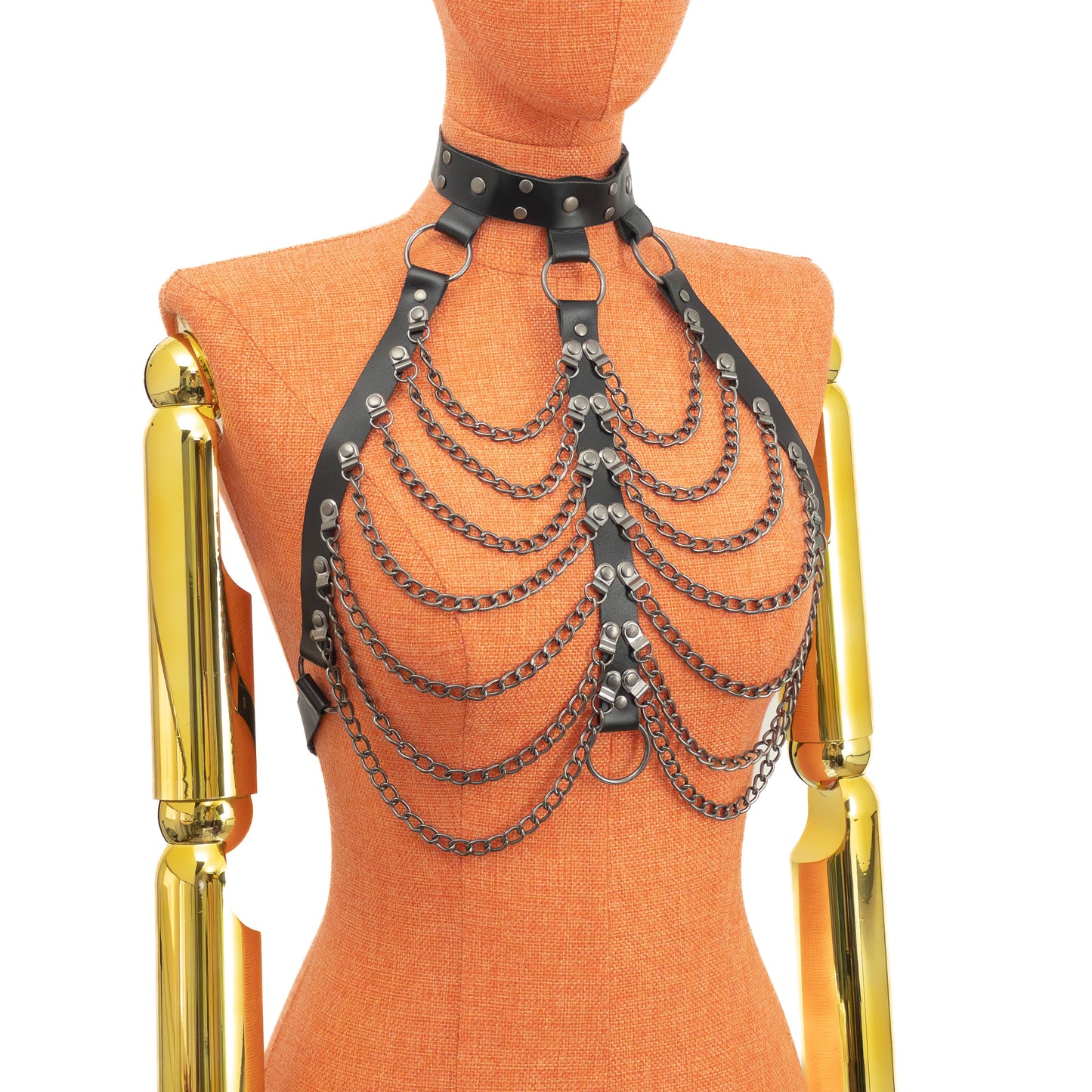 Three-quarter mannequin view of leather choker harness showing layered chest chains and side strap connections leading to back fastening; strap width 1 inch (2.5 cm) and 3/4 inch (2 cm), leather thickness 1.4–1.8 mm, dark nickel hardware.