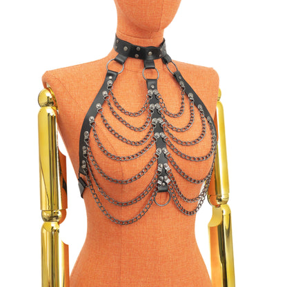 Three-quarter mannequin view of leather choker harness showing layered chest chains and side strap connections leading to back fastening; strap width 1 inch (2.5 cm) and 3/4 inch (2 cm), leather thickness 1.4–1.8 mm, dark nickel hardware.