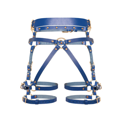 Rear view of the Torquea leather butt harness showing the wide waist belt, adjustable hip belt, center rear O-ring, Y-shaped leather support straps, double adjustable thigh straps, side D-rings, and gold-tone metal hardware.