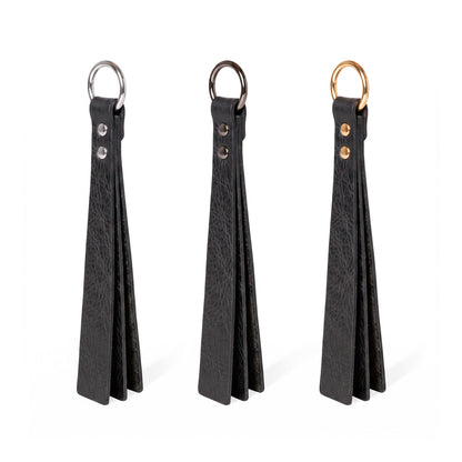Three black classic Short leather BDSM paddle silver, black, and gold rings, displayed side-by-side on a white background.