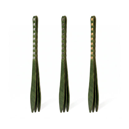 Three green leather bdsm paddles with hardware in silver, gold and dark nickel colors.