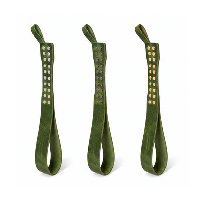 Three leather Loop Core BDSM paddle  green coloring and silver, gold and dark nickel hardware.