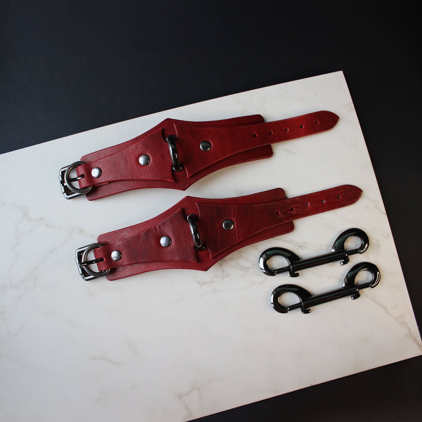 red leather handcuffs 
