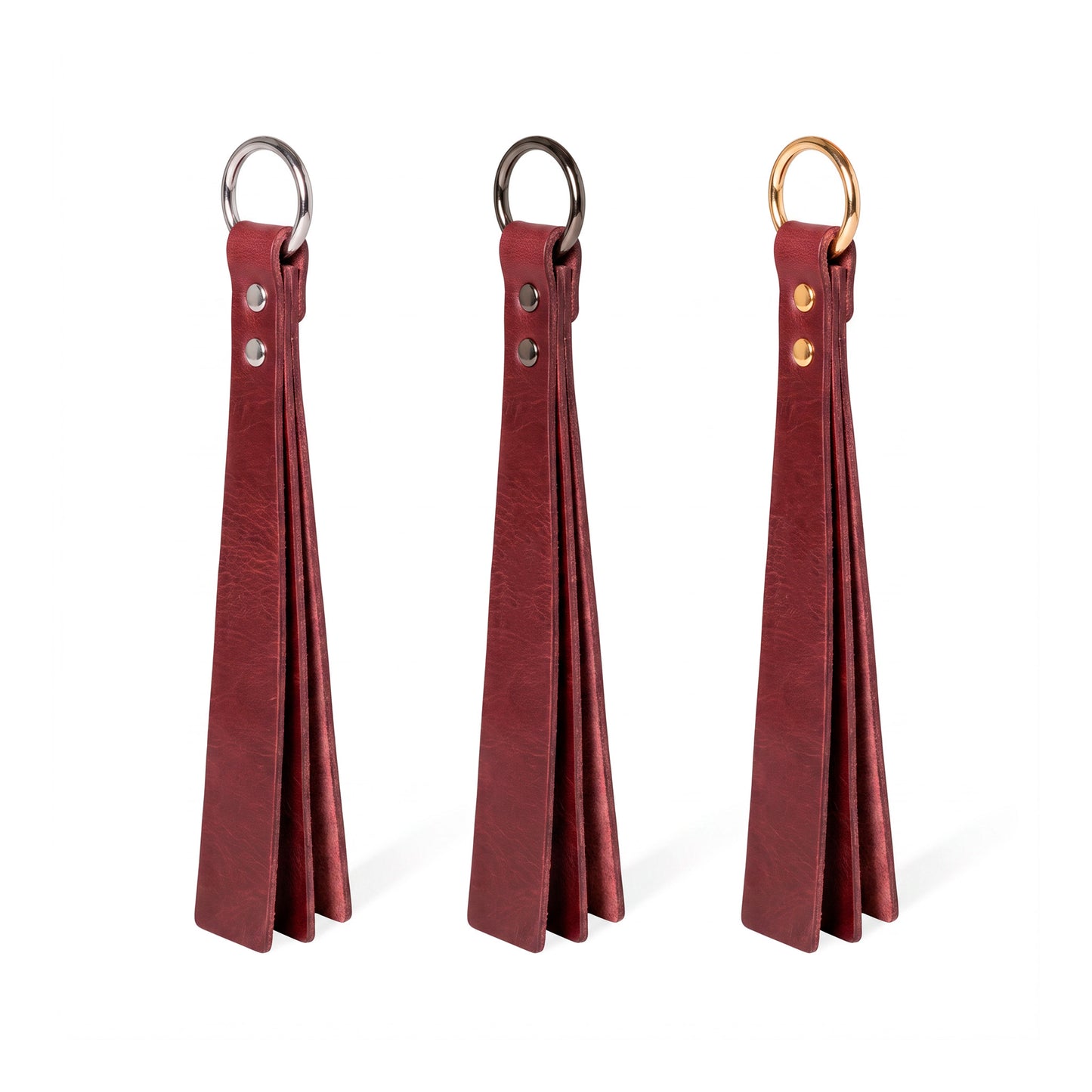 Three marsala classic Short leather BDSM paddle silver, black, and gold rings, displayed side-by-side on a white background.