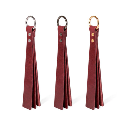 Three marsala classic Short leather BDSM paddle silver, black, and gold rings, displayed side-by-side on a white background.