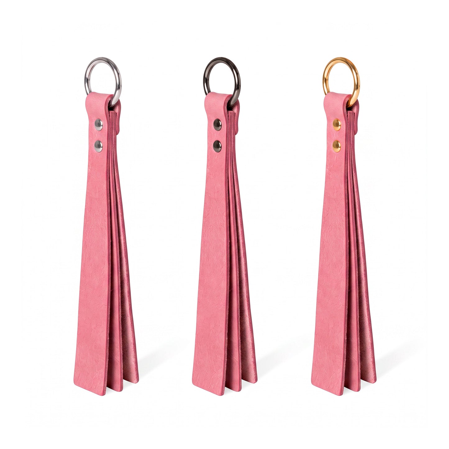 Three pink classic Short leather BDSM paddle silver, black, and gold rings, displayed side-by-side on a white background.